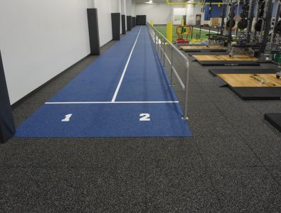 Performance Roll over Performance UltraTiles in fitness facility.